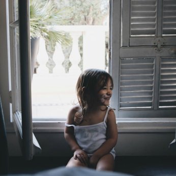 Little girl giggling