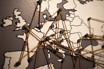World map with pins in it