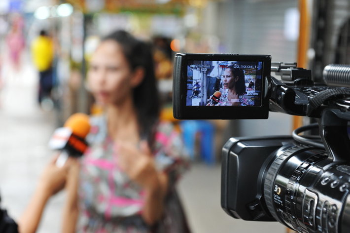 Person on the street being interviewed