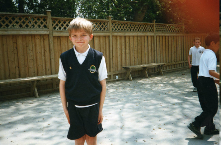 A boy in a schoolyard