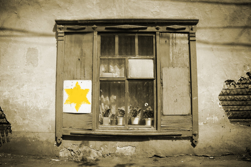 A yellow star on a building