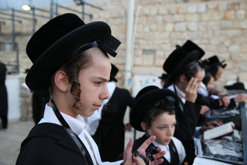 Young men praying