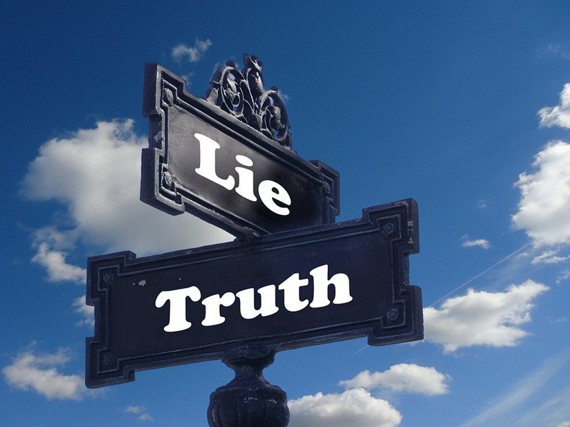 Truth and lies sign