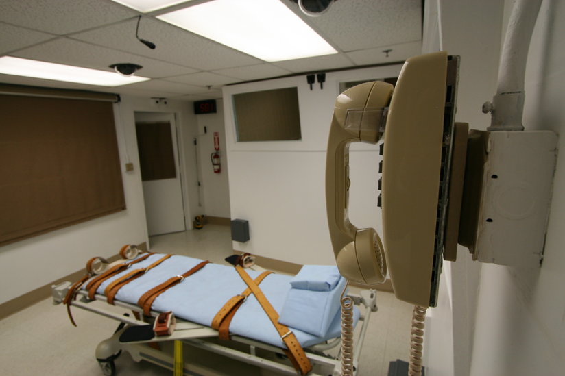Bed with straps and phone