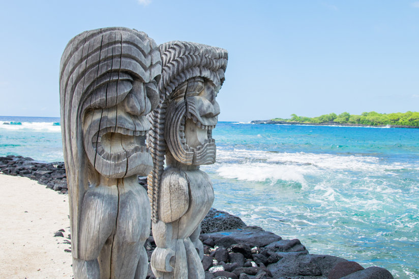 Carvings against the ocean