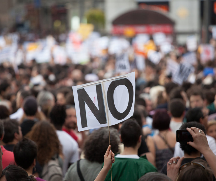 Protestors with a sign